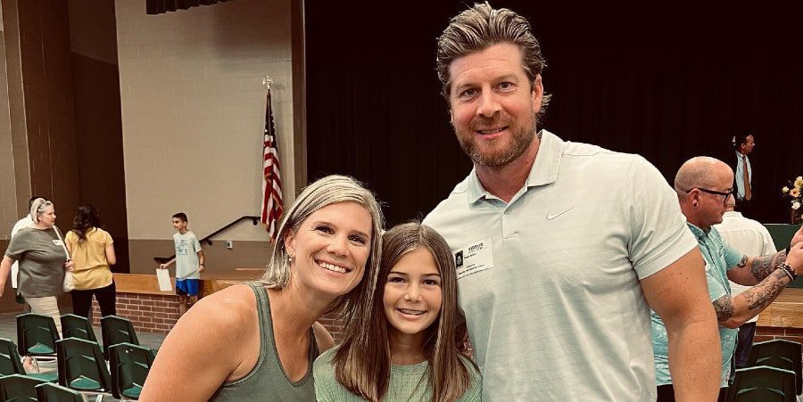 A man and a woman and their daughter