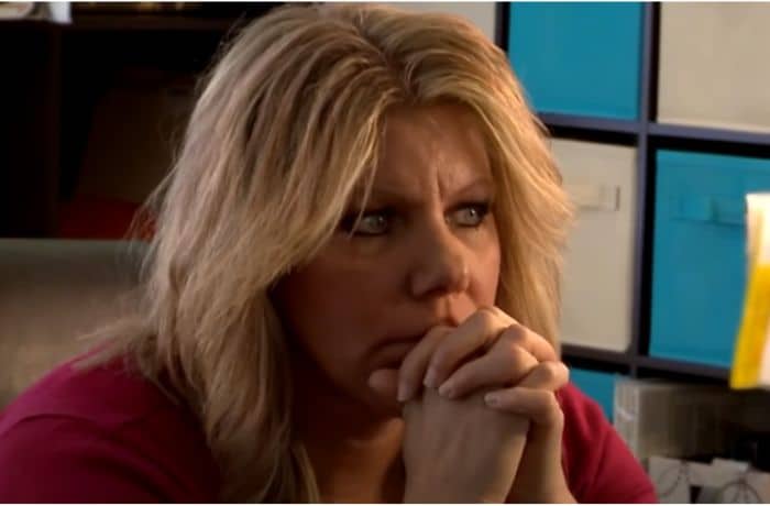 She looked somber after giving Robyn the news that her divorce from Kody is final - YouTube/TLC